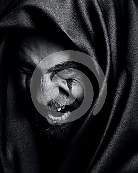 Rage of angry evil spooky malefic man photo