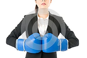 Rage businesswoman wearing boxing gloves