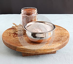 Ragi Flour in a Bowl on a Wooden Table