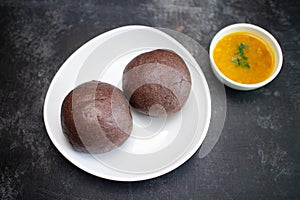 Ragi Mudde, finger millet balls with Dal curry snack in Karnataka, India