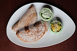 Ragi Set Dosa, Songy soft pancake, , dosa made with fermented batter of finger millet, rice and lentils, south Indian food photo