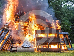 Raging Bonfire. Pile of burning pallets