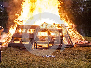 Raging Bonfire. Pile of burning pallets