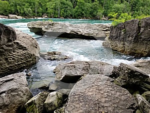 Raging river with big rocks in Niagara Falls, Canada