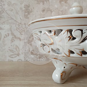 Ragment of a vintage porcelain bowl photo