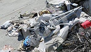 rags and garbage in a homeless camp