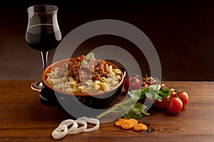 Ragu pasta and red wine photo