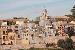 ragusa sicily italy town medium shot church buildings homes houses on hill 199 p