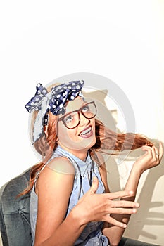 Raid haired girl with glasses smile photo