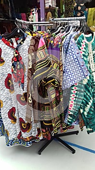 Rail of African clothing on market Peckham south london.