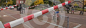 Rail level crossing near railstation Soest Netherlands