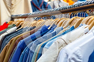 Rail of second-hand clothes on display