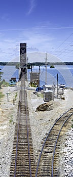 Rail tracks in Alabama onto a bridge photo