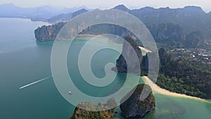 Railay Beach Krabi Thailand a tropical beach with a turqouse colored ocean