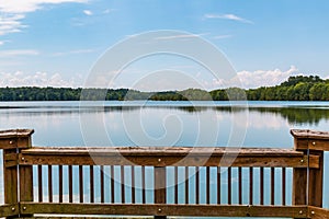 Railing of Fishing Pier with View of Stumpy Lake in Virginia Beach