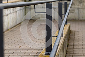 a railing on a footpath