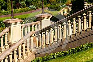 Railing made of stone among the greenery