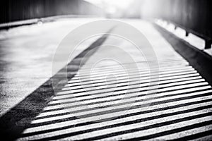 Railing shadow on the bridge