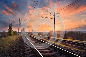 Railroad against beautiful sky at sunset. Industrial landscape