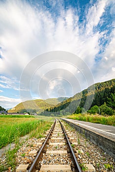 Storm cloud over a railroad photo