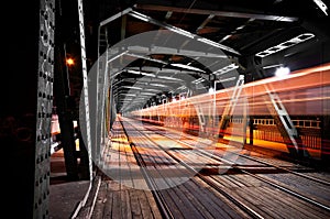 Railroad bridge at night