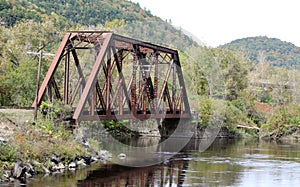 Railroad Bridge Over Water in Autumn