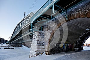 Railroad bridge and stony underway in wintertime