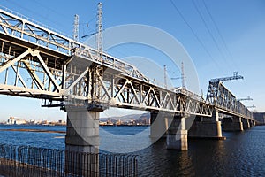 Railroad bridge winter river
