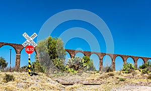 Railroad crossing at the Aqueduct of Padre Tembleque in Mexico photo