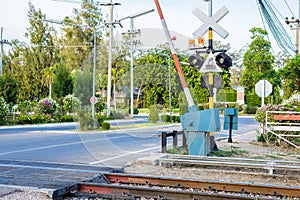 Railroad crossing with barriers photo