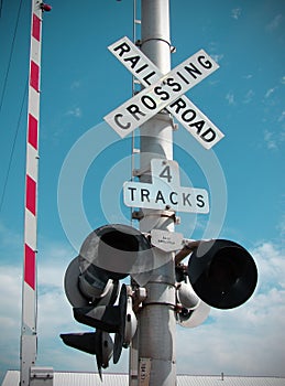 Railroad crossing gate and sign