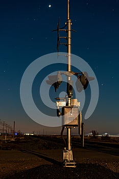 Railroad crossing light at night