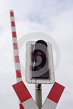 Railroad crossing signal light and open bar