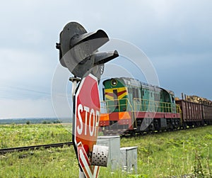 Railroad crossing signs and the approaching train