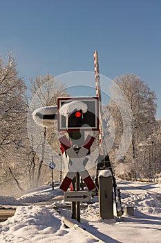 Railroad crossing in winter