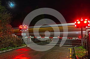 Railroad crossing during a winter afternoon in a city in England, January 2022