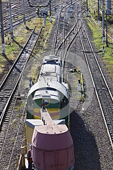 Railroad and freight train on vertically oriented frame.