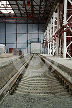 Railroad going into the distance on hangar