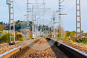 Railroad going into distance in sunny day