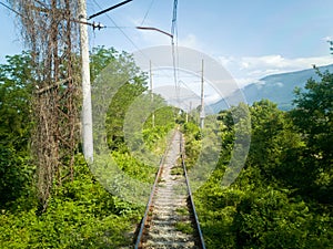 Railroad through the mountains. Wild path for train in Abkhazia.