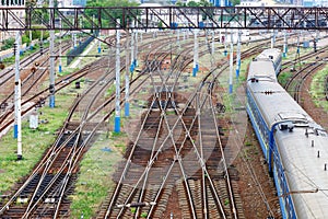 Railroad network with moving train carriages, top view