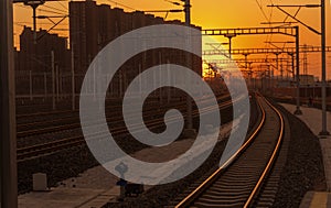 Railroad - Railway at sunset with sun