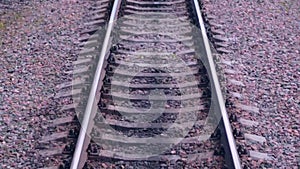 Railroad. Railway tracks from moving train. Travelling background.