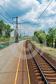 Railroad suburban halt in daytime