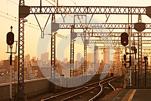 Railroad at sunset. Industrial landscape with railway station