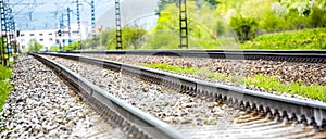 Railroad track rails in coutry landspace.