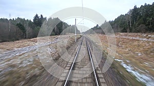 Railroad track running through coutry landscapes