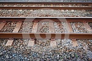 Railroad track in the station on the street