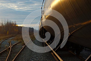 Railroad track and wagon train oil container