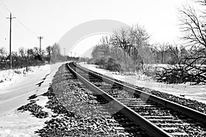 Railroad Track in Winter Landscape
